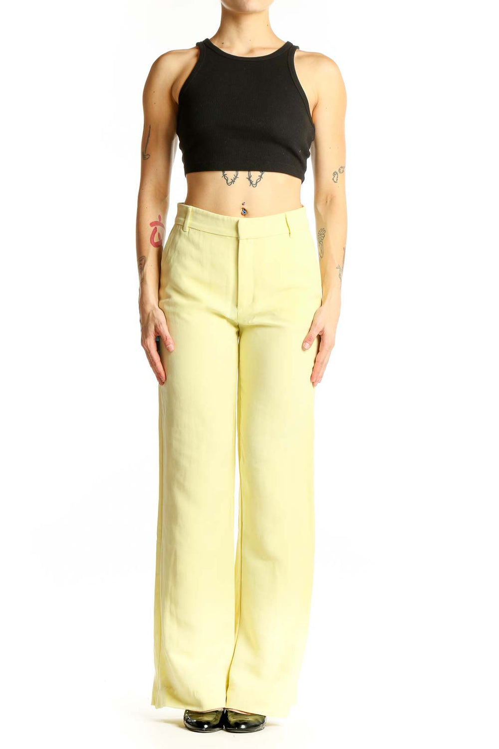 Front view of Zara yellow wide-leg trousers on model
