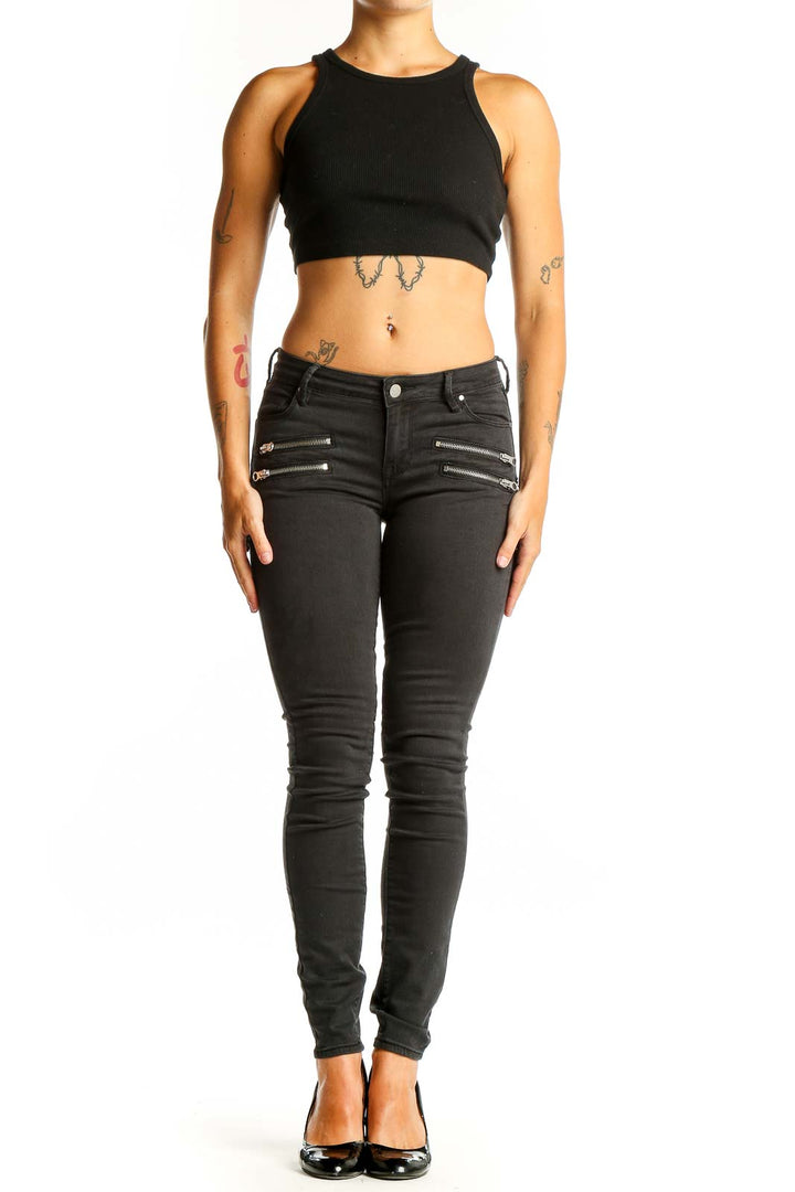 Front view of black Bullhead skinny jeans with zipper details