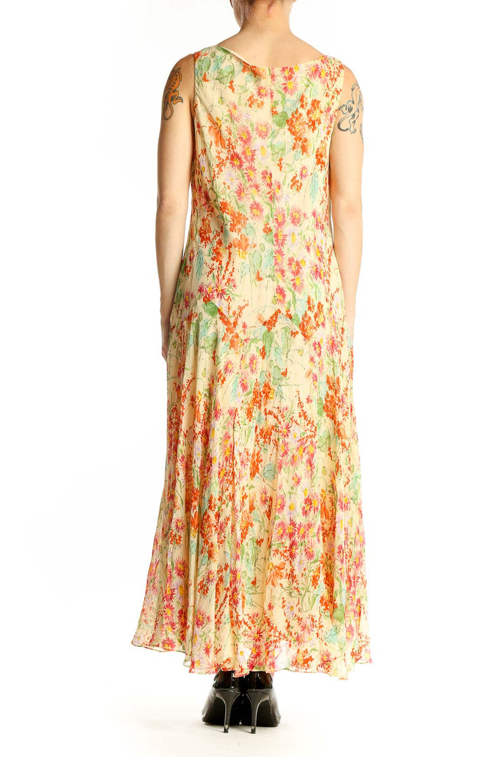 Side view of Jones New York yellow floral silk maxi dress showing flowing silhouette