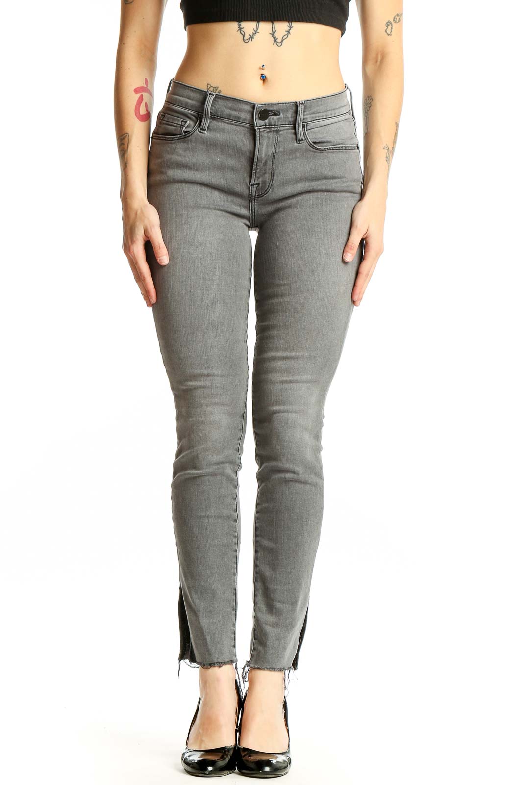Front view of gray FRAME Denim skinny jeans with ankle slits