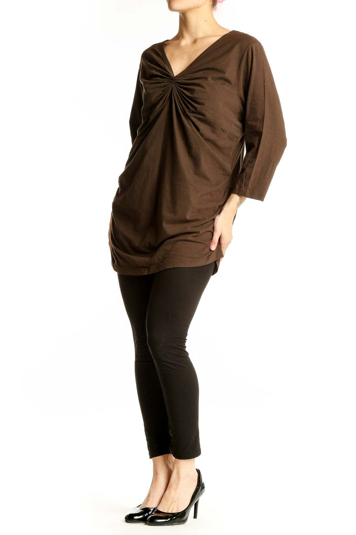 Front view of Michael Kors brown ruched V-neck long sleeve top