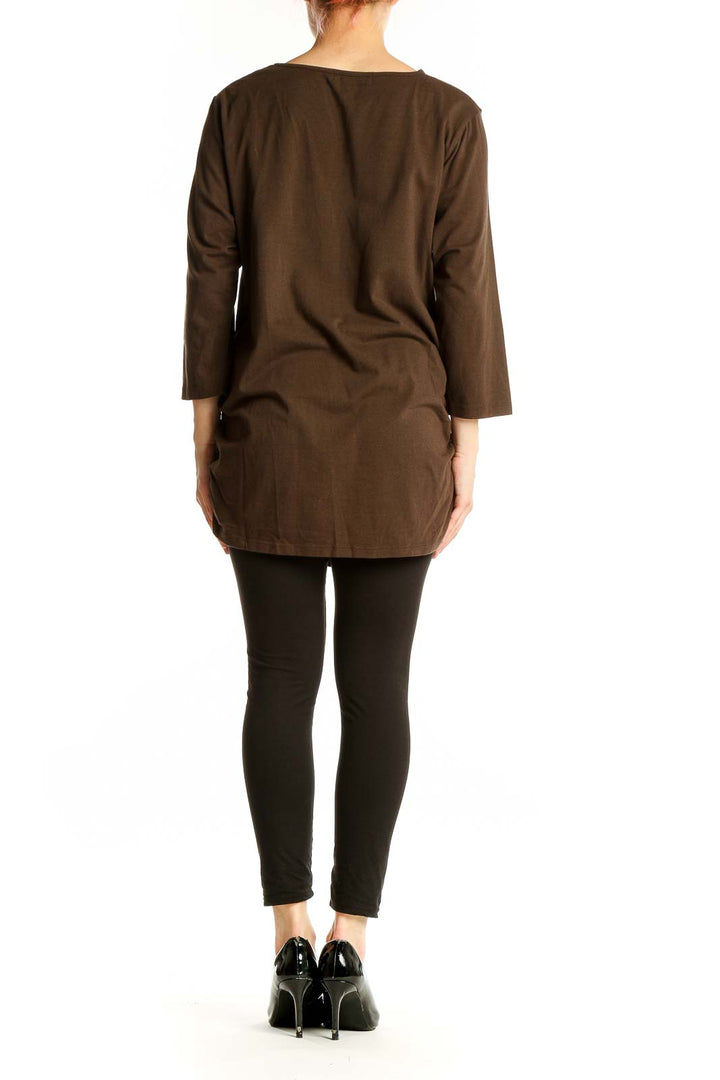 Back view of Michael Kors brown ruched V-neck long sleeve top on model