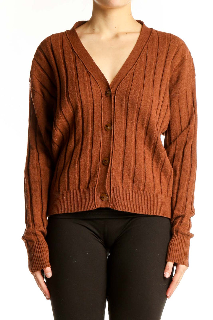Front view of Sita Murt rust ribbed V-neck cardigan
