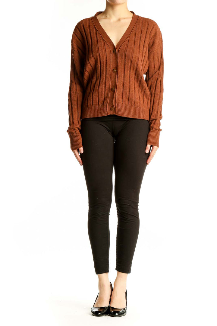 Front view of Sita Murt rust ribbed V-neck cardigan
