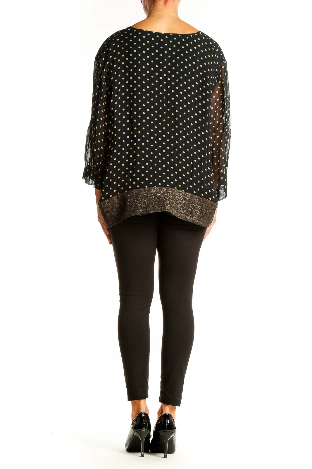 Back view of April Cornell black polka dot blouse showing relaxed fit and long sleeves