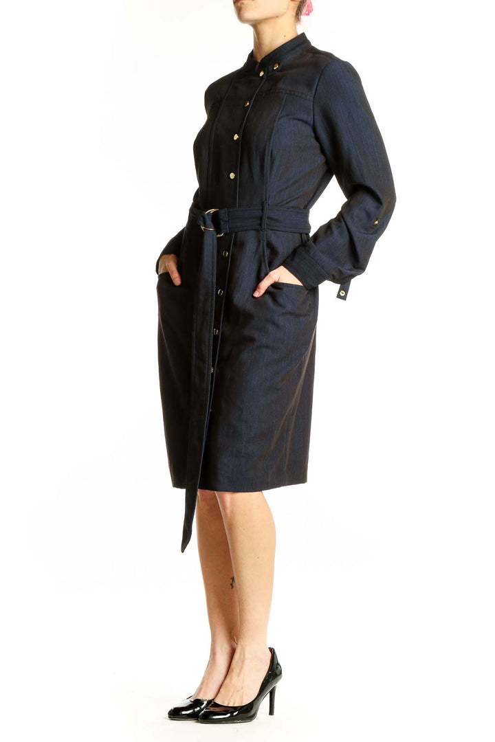 Front view of navy Calvin Klein button-front shirt dress with belt