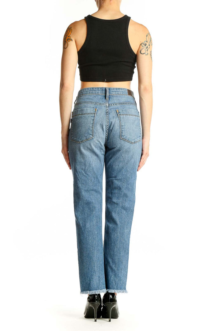 Side view of model wearing PS Parker Smith light blue straight leg jeans