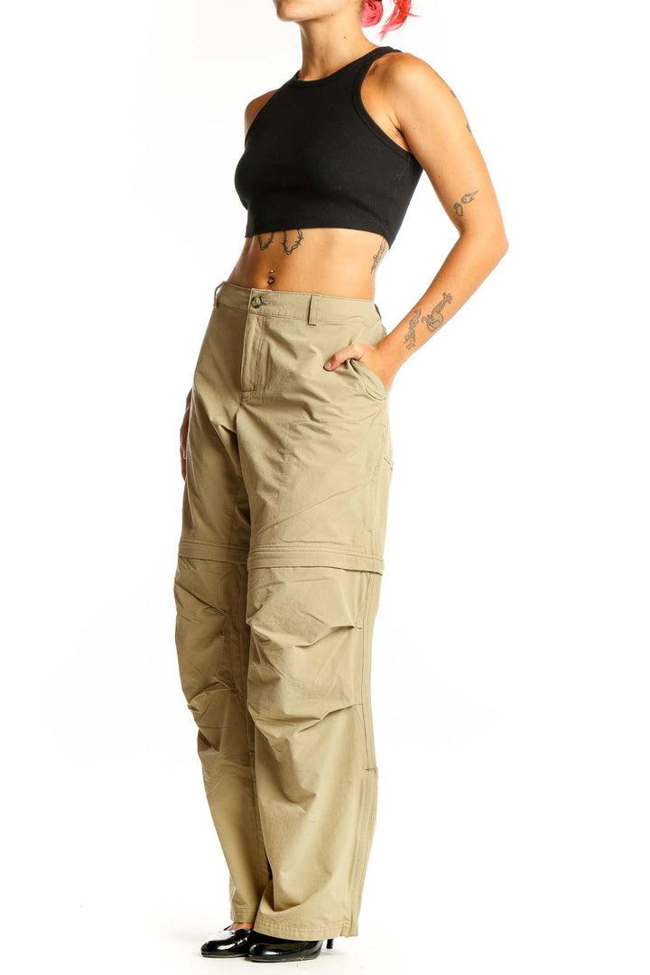Front view of khaki convertible cargo pants with multiple pockets