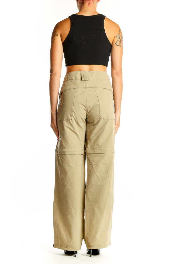 Side view of model wearing khaki convertible cargo pants