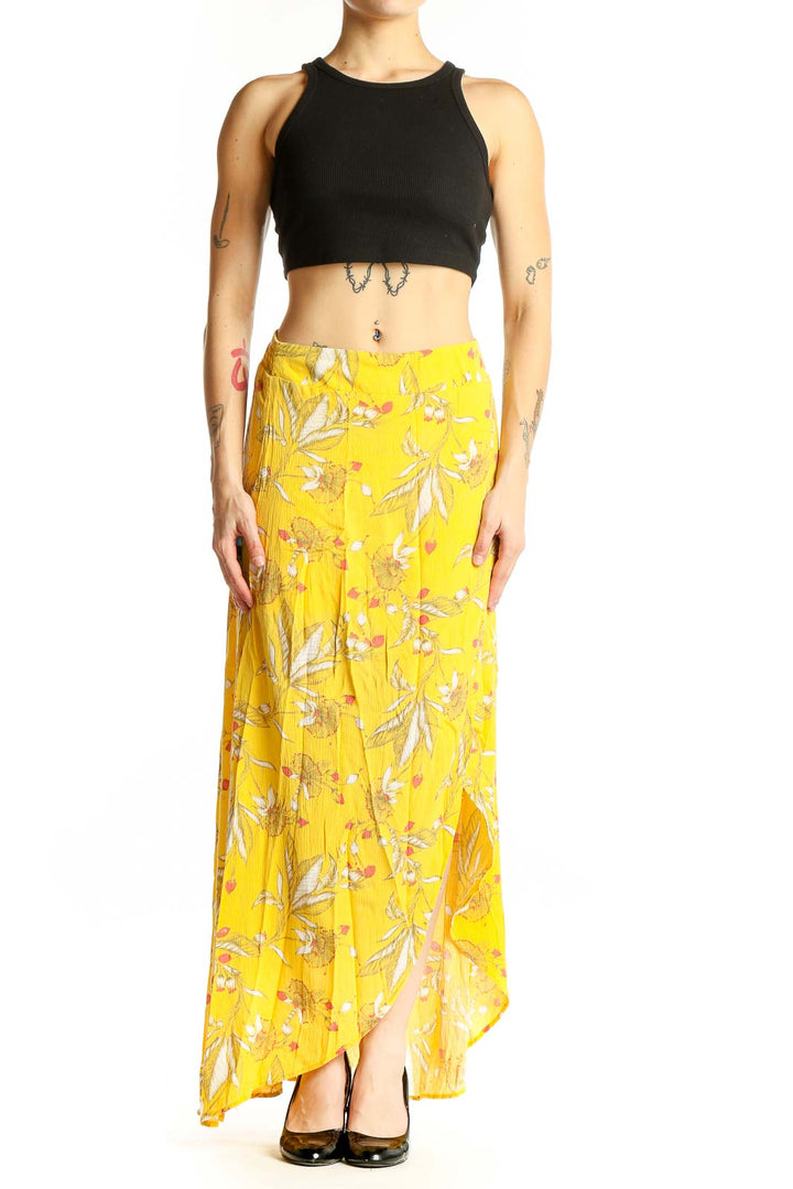 Front view of yellow floral rayon maxi skirt with high-low hemline