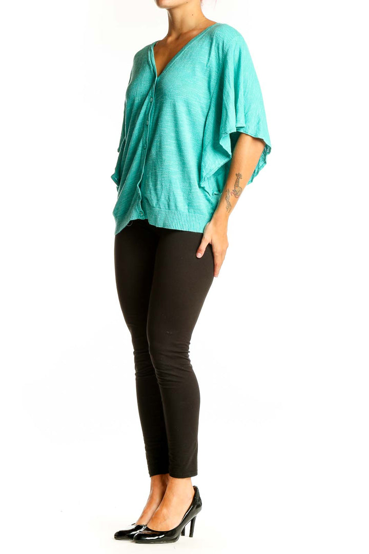 Front view of teal Jones New York button-front cardigan with batwing sleeves