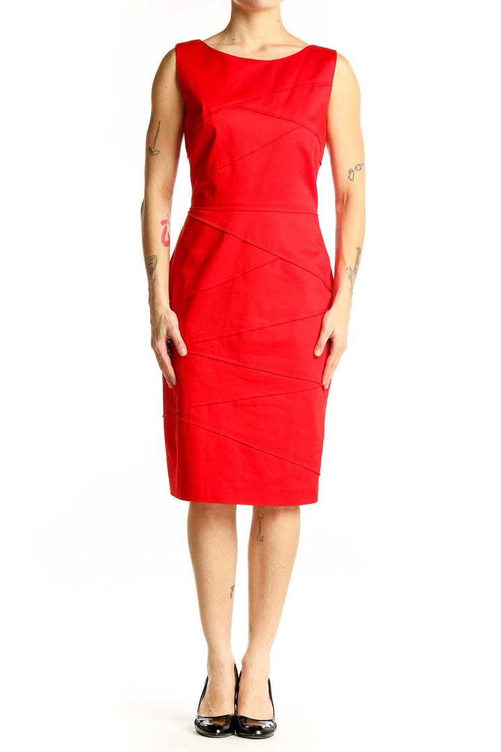 Front view of red sleeveless Calvin Klein bodycon dress with asymmetrical seams