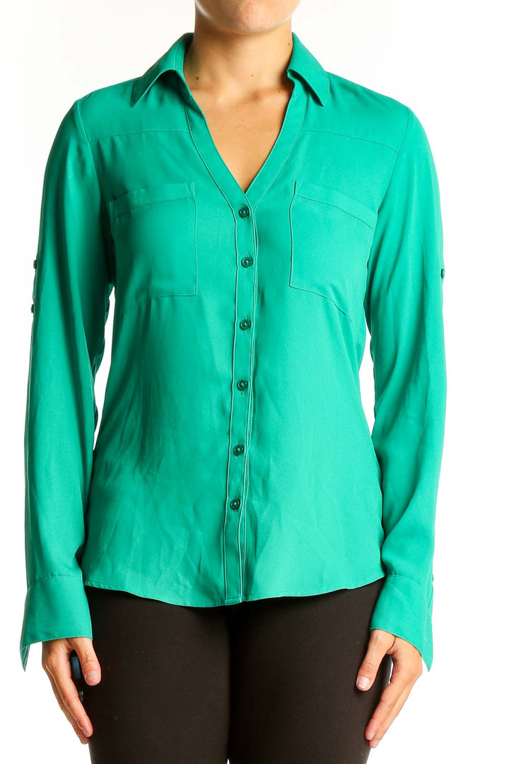 Front view of green Express button-down shirt with collar and pockets