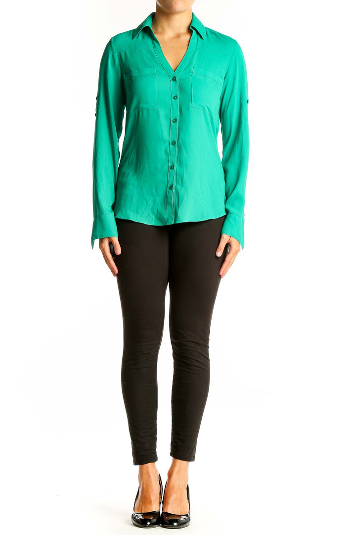 Front view of green Express button-down shirt with collar and pockets