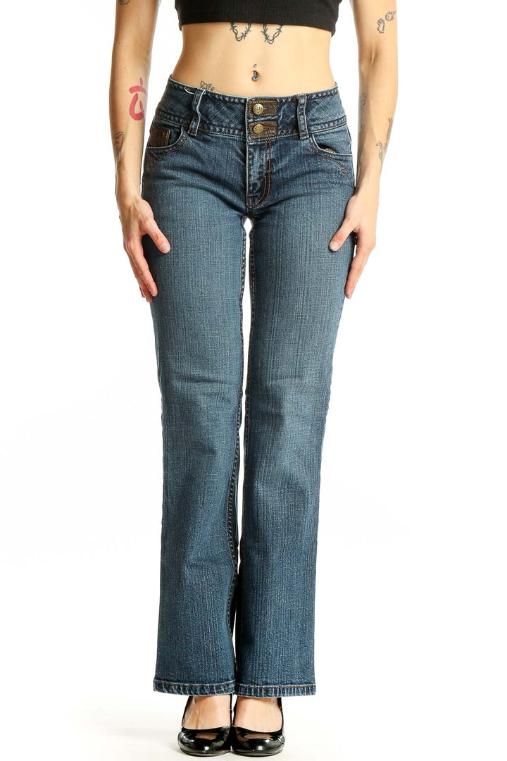 Front view of Cabi blue bootcut jeans on model