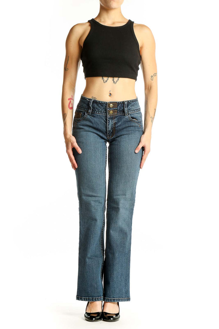 Front view of Cabi blue bootcut jeans on model