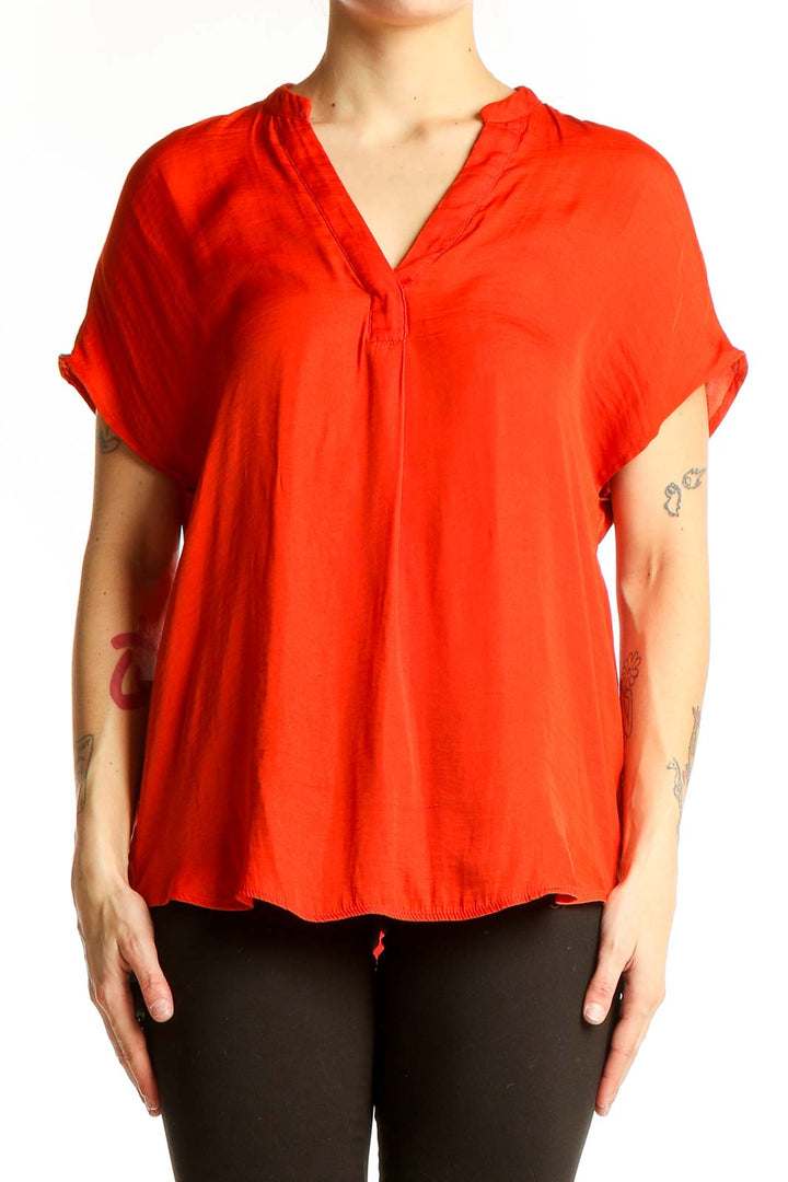 Front view of red RACHEL Rachel Roy V-neck short sleeve blouse
