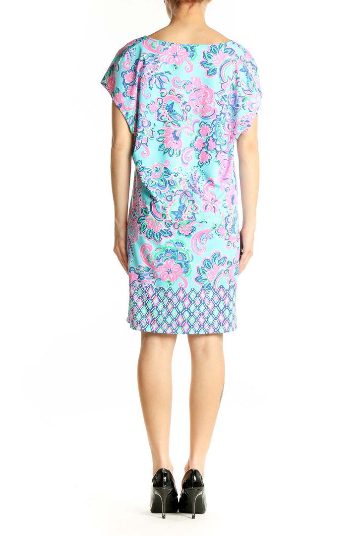 Side view of Lilly Pulitzer turquoise floral shift dress showing cap sleeve