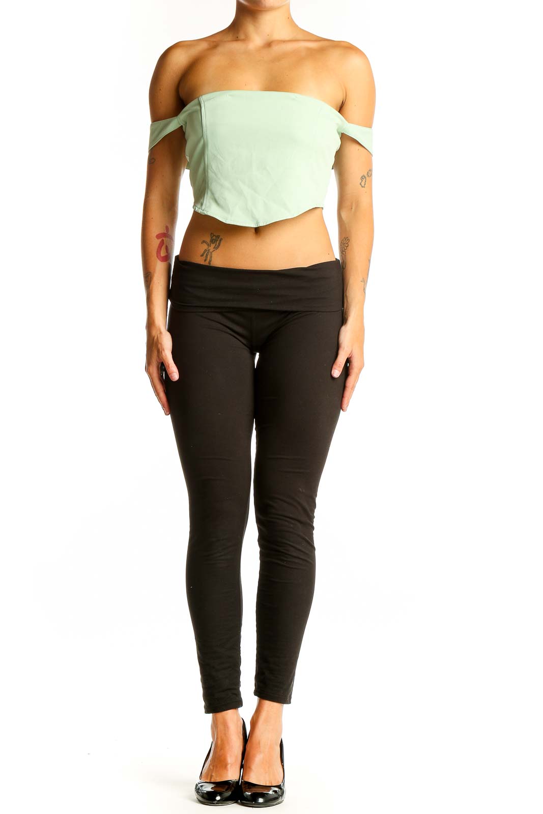 Front view of Cider mint green off-shoulder crop top on model