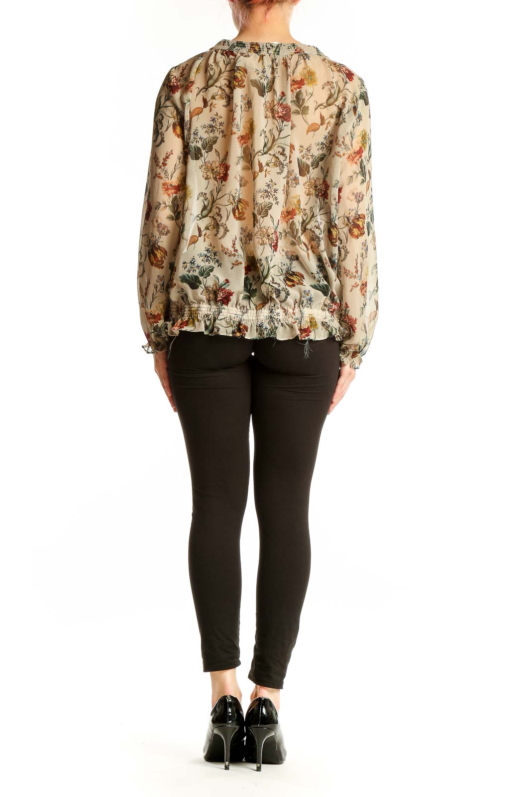 Back view of Zara Basic beige floral print peasant blouse showing elasticated hem