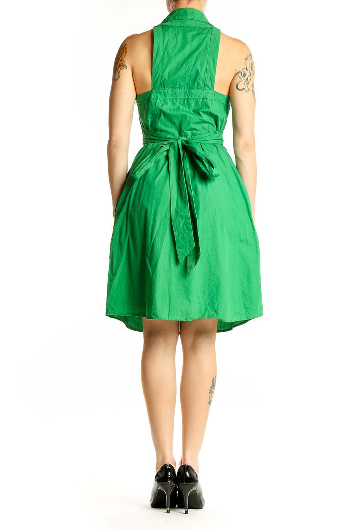 Side view of green cotton halter neck dress by Maeve
