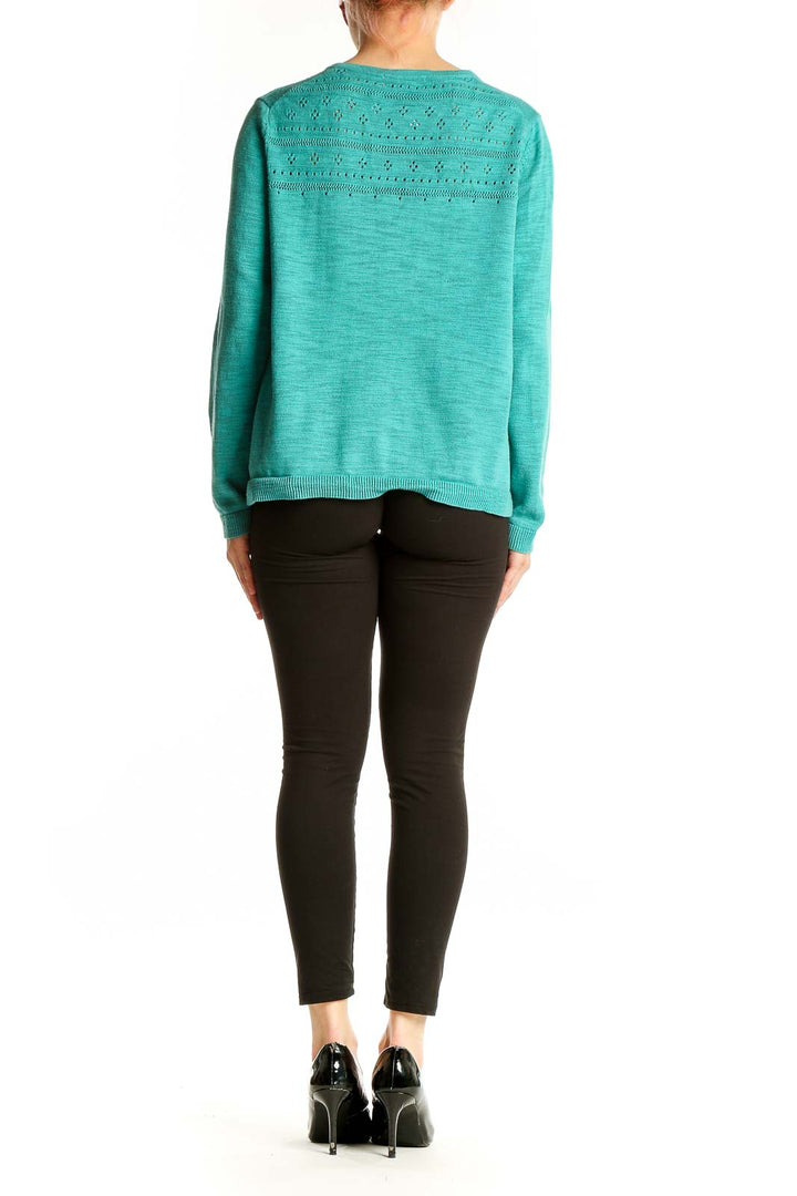 Side view of teal Coldwater Creek knit cardigan buttoned up