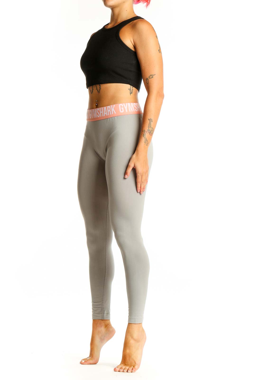 Front view of Gymshark gray high-waisted leggings with pink waistband