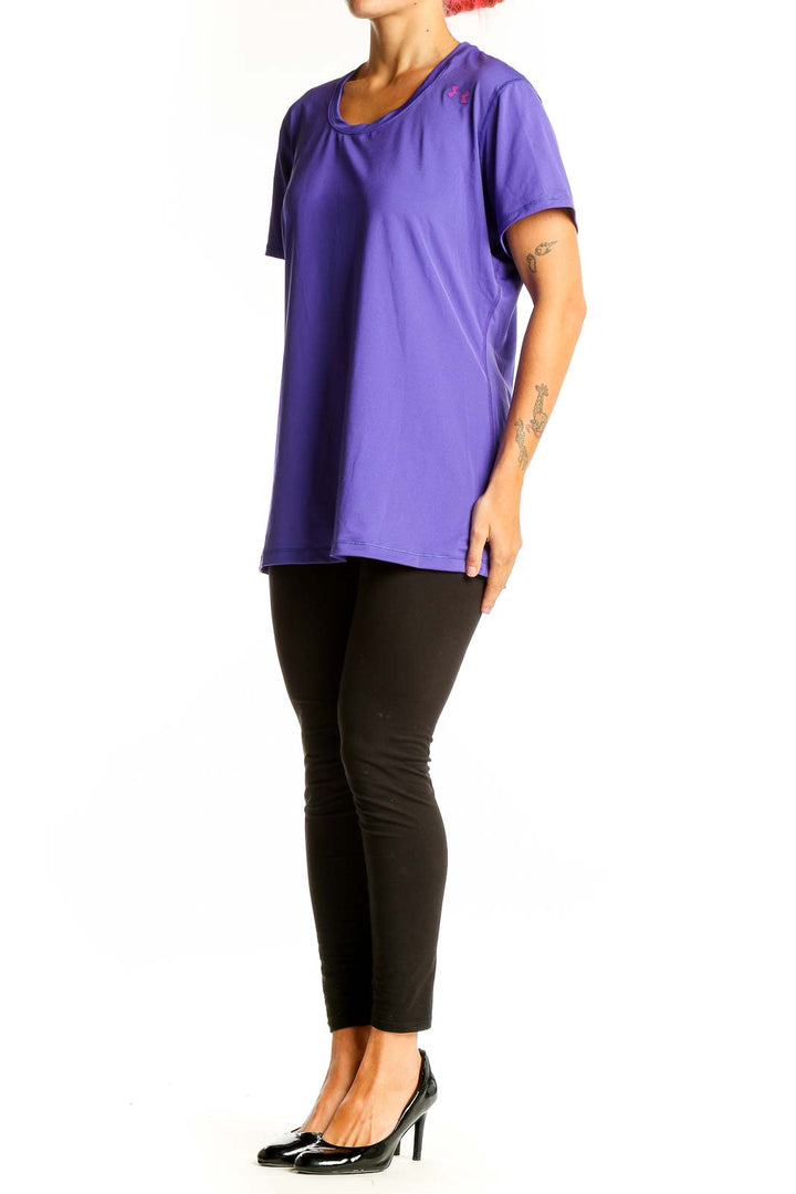 Front view of purple Under Armour performance t-shirt