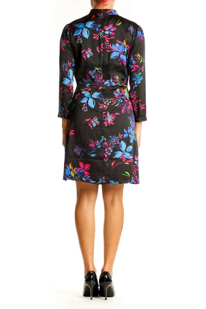 Side view of bar III Black Floral Print Mock Neck Dress showing 3/4 length sleeves