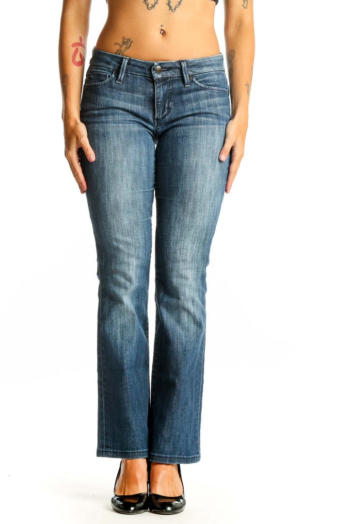 Front view of Joe's blue bootcut jeans on model