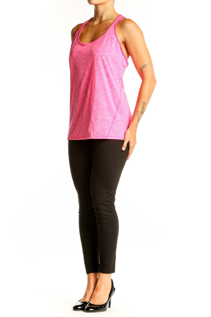 Front view of pink heathered racerback tank top from Ideology