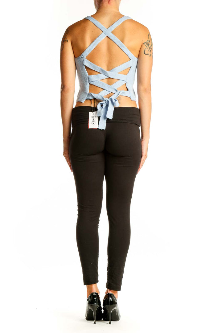 Side view of Cider Light Blue Cropped Knit Tank Top showing length and fit