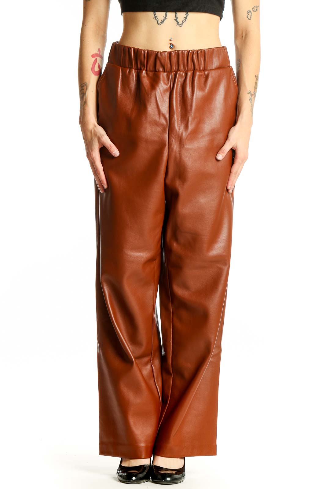 Front view of BLANKNYC brown faux leather wide-leg pants