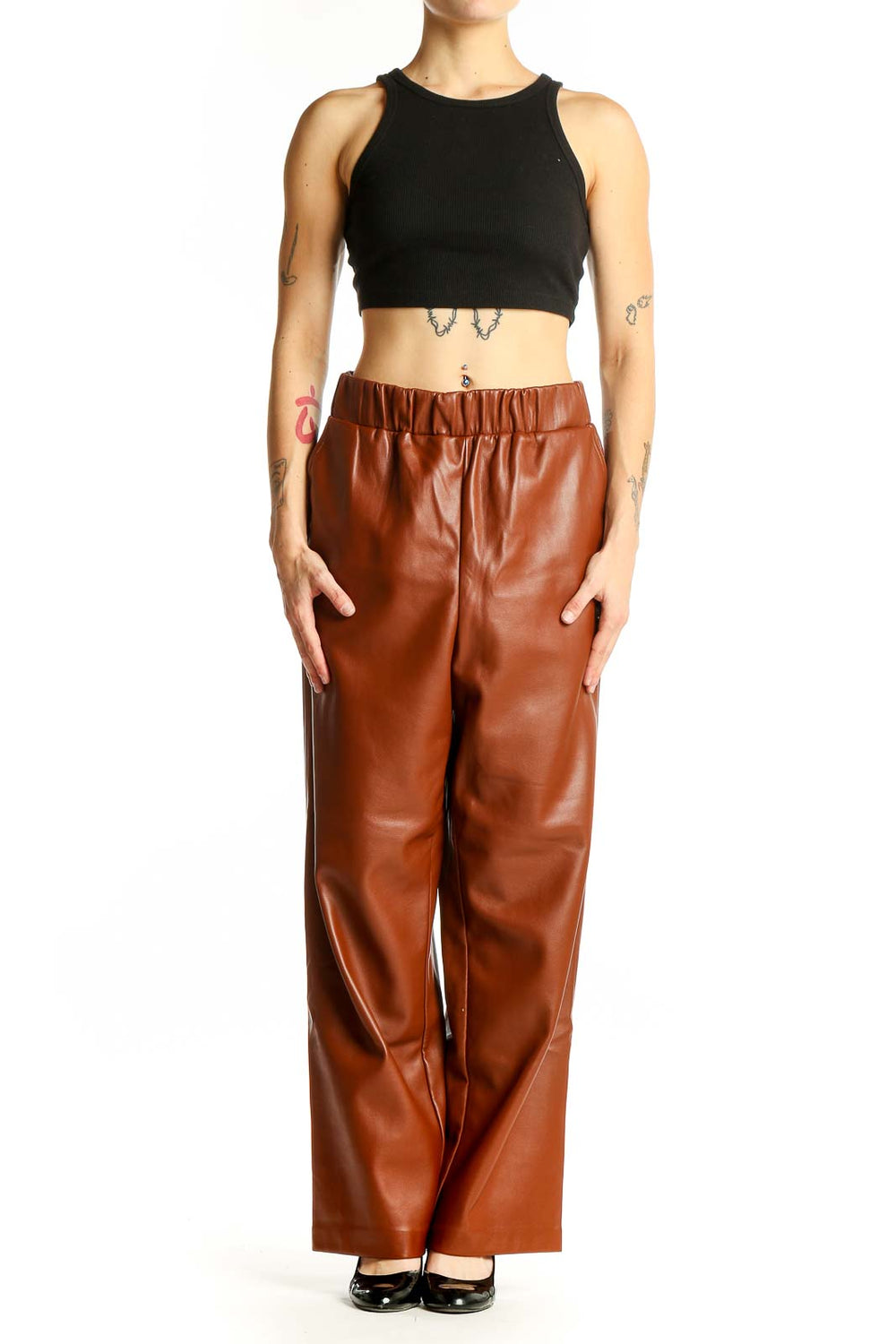 Front view of BLANKNYC brown faux leather wide-leg pants