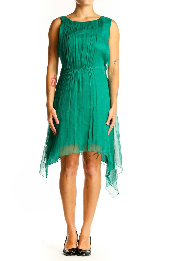Front view of emerald green silk pleated cocktail dress by Leon Max