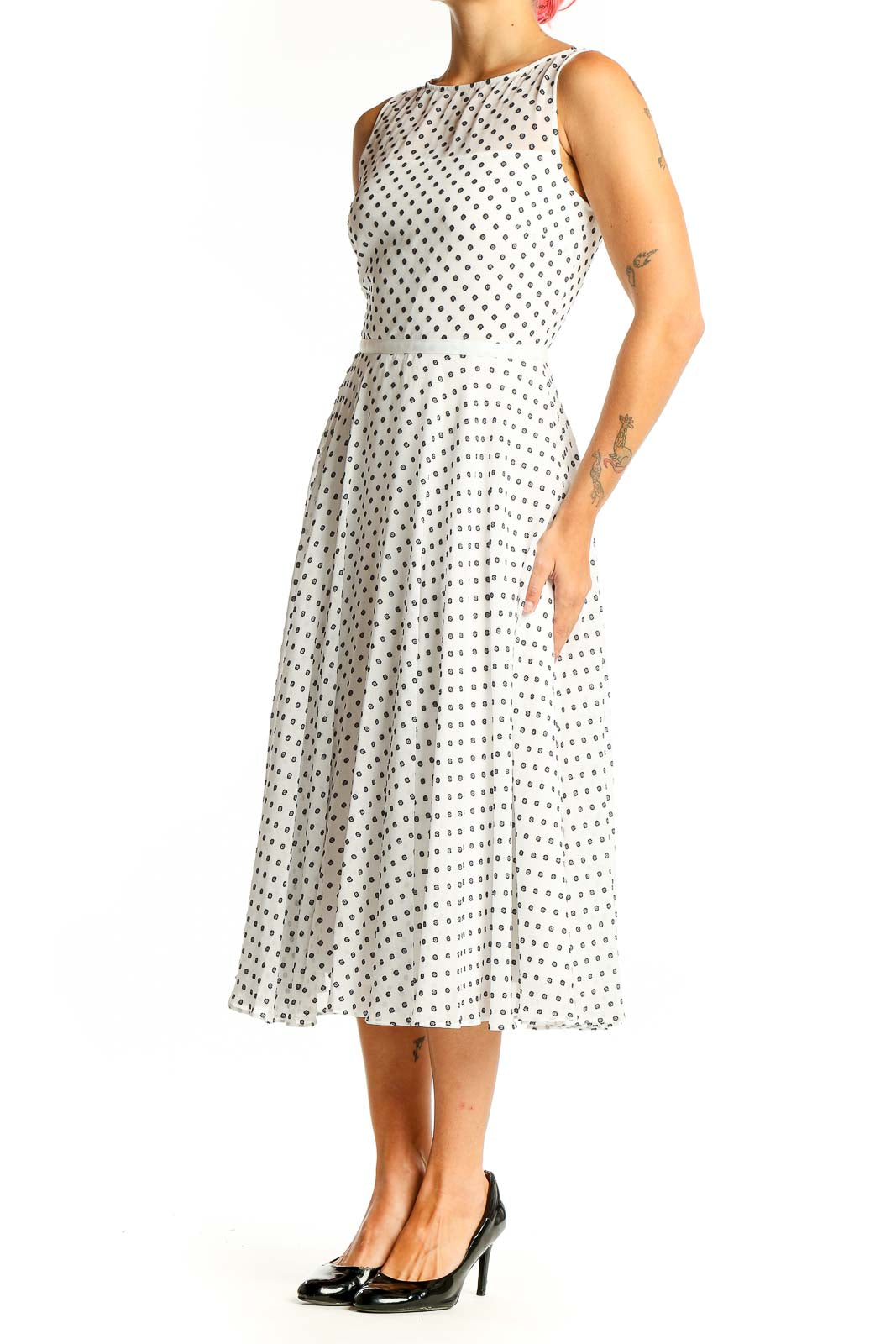 Front view of Hobbs London white sleeveless midi dress with black polka dots