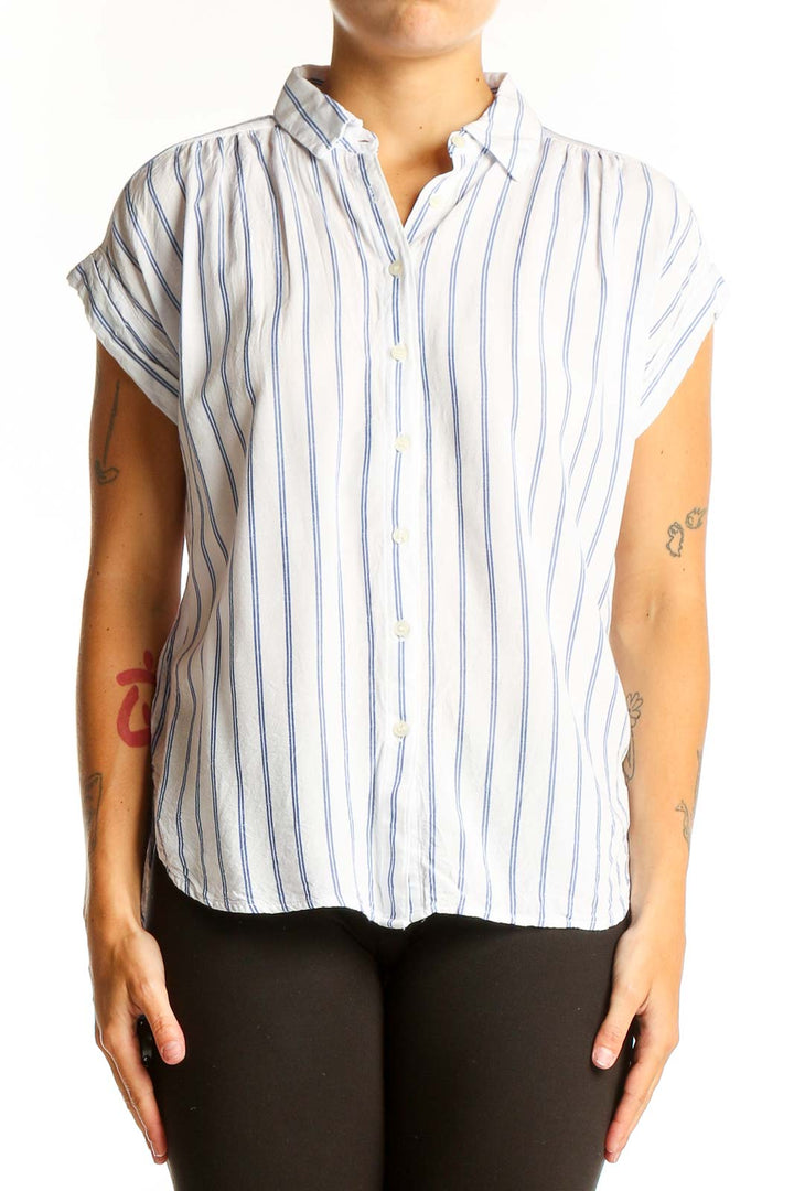 Front view of LOFT white and blue striped rayon blouse with button-down front