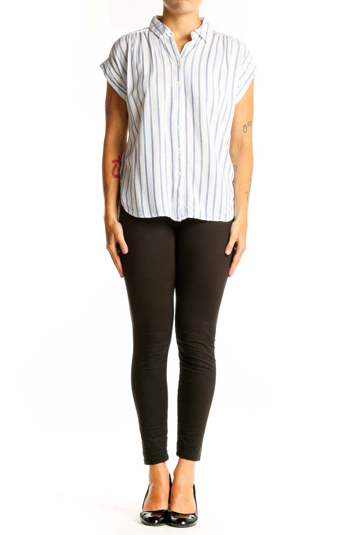 Front view of LOFT white and blue striped rayon blouse with button-down front