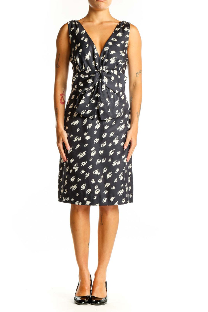Front view of Kate Spade black silk cocktail dress with white floral print