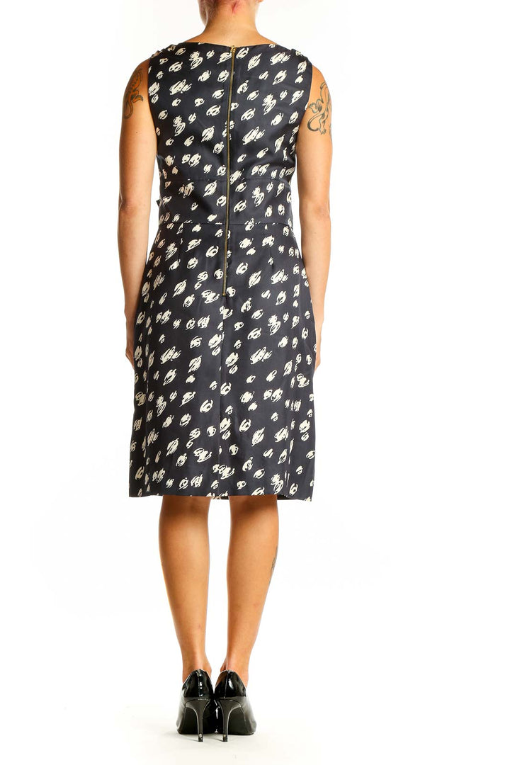 Side view of Kate Spade black silk cocktail dress showing gathered waist detail