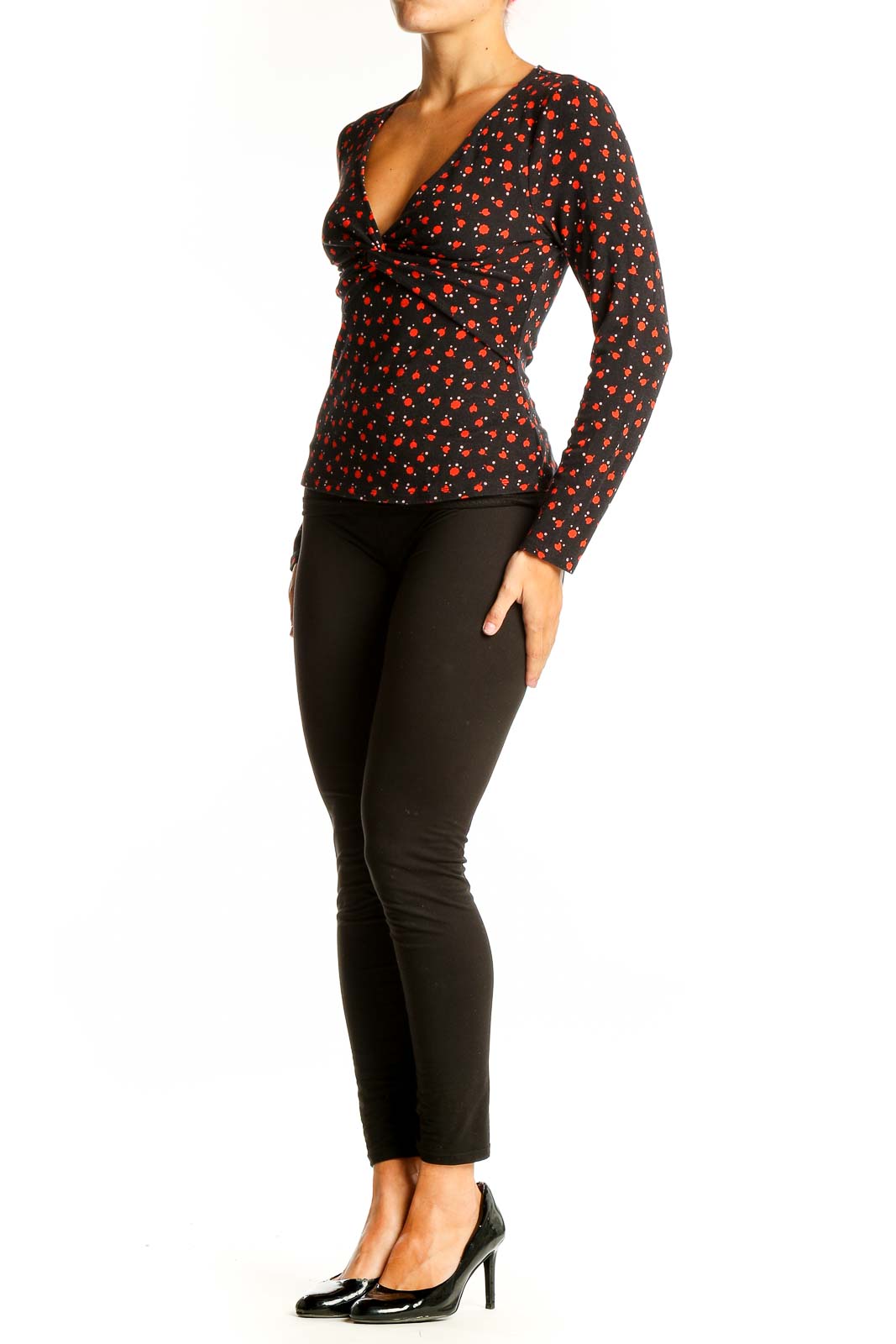 Front view of Boden black V-neck top with red cherry blossom print and twist detail