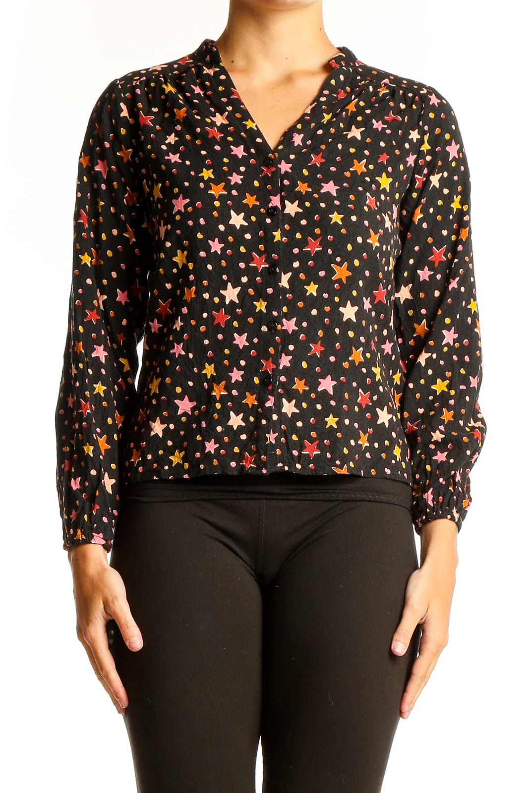 Front view of Sugarhill Brighton black blouse with colorful star print