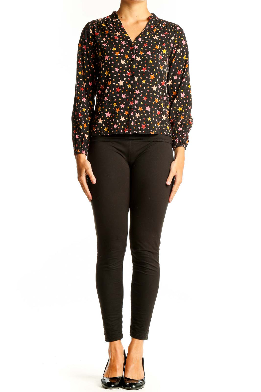 Front view of Sugarhill Brighton black blouse with colorful star print