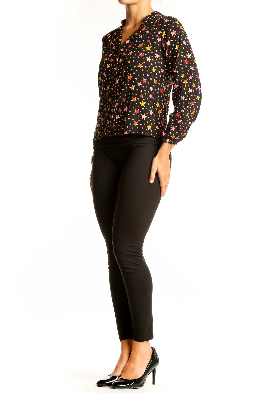 Front view of Sugarhill Brighton black blouse with colorful star print