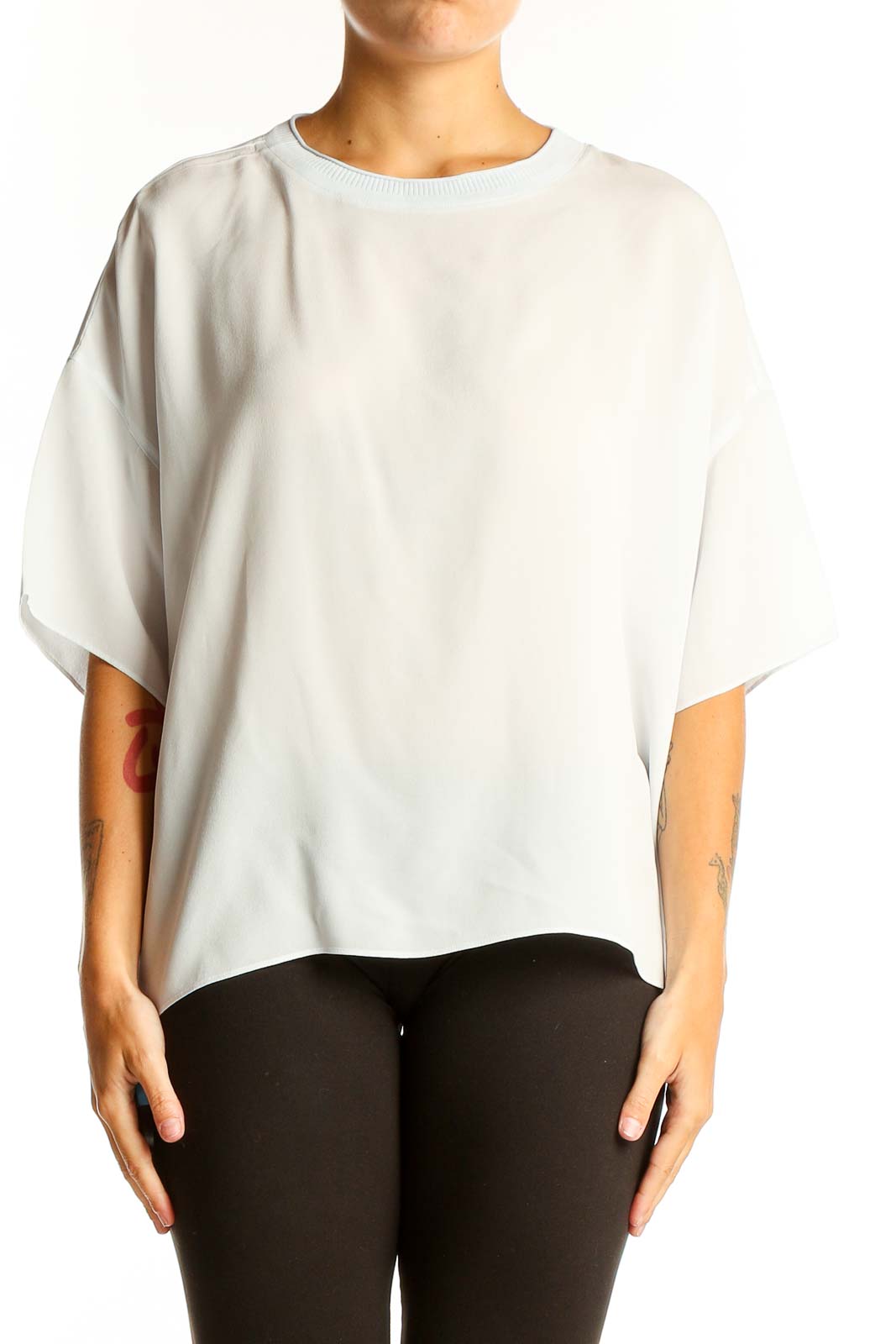 Front view of white silk oversized blouse by Vince