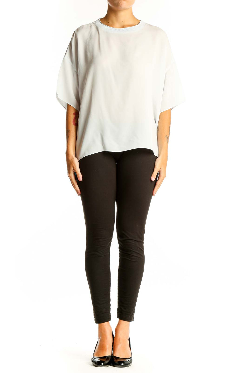 Front view of white silk oversized blouse by Vince