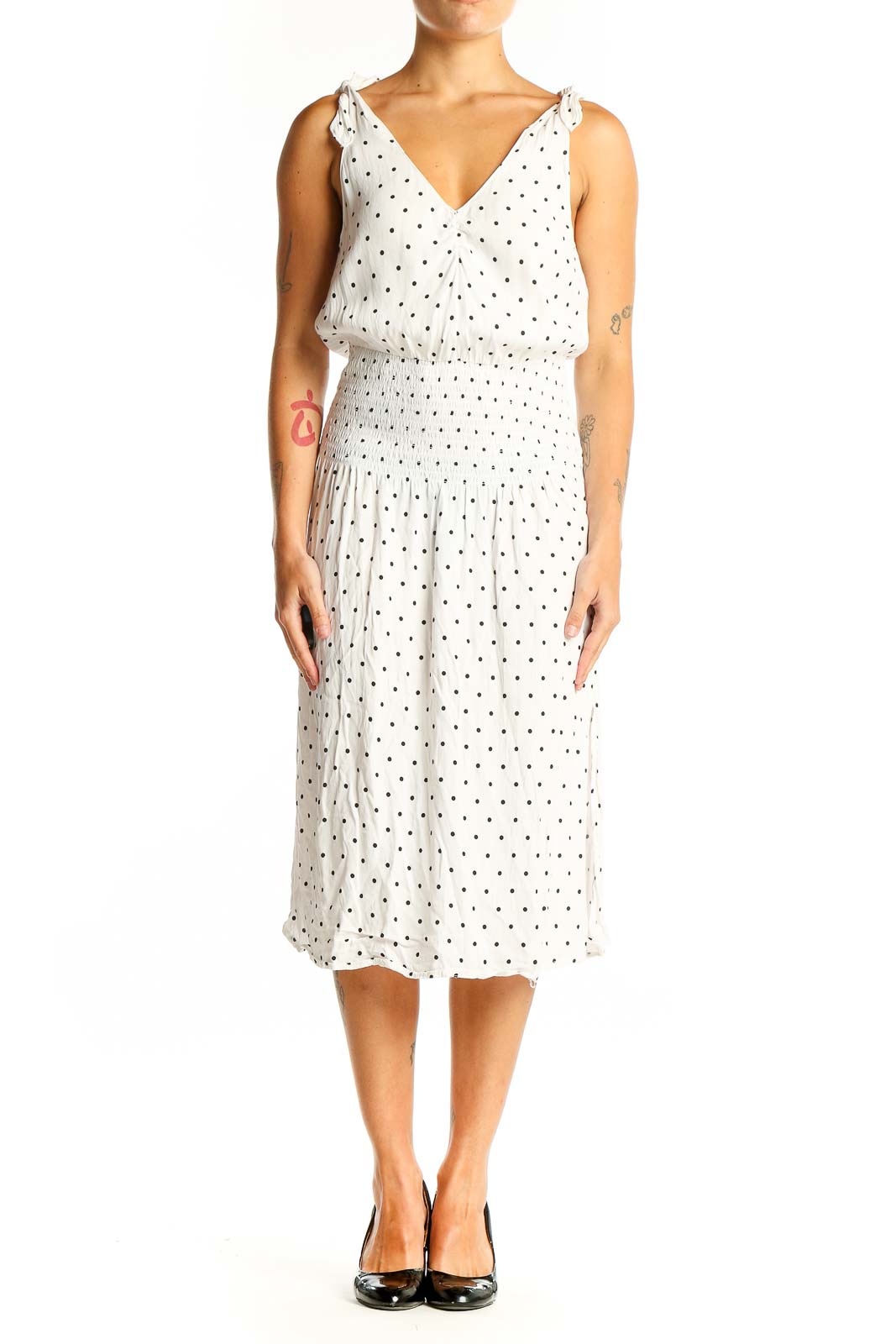 Front view of white polka dot midi dress with V-neck and tie shoulders