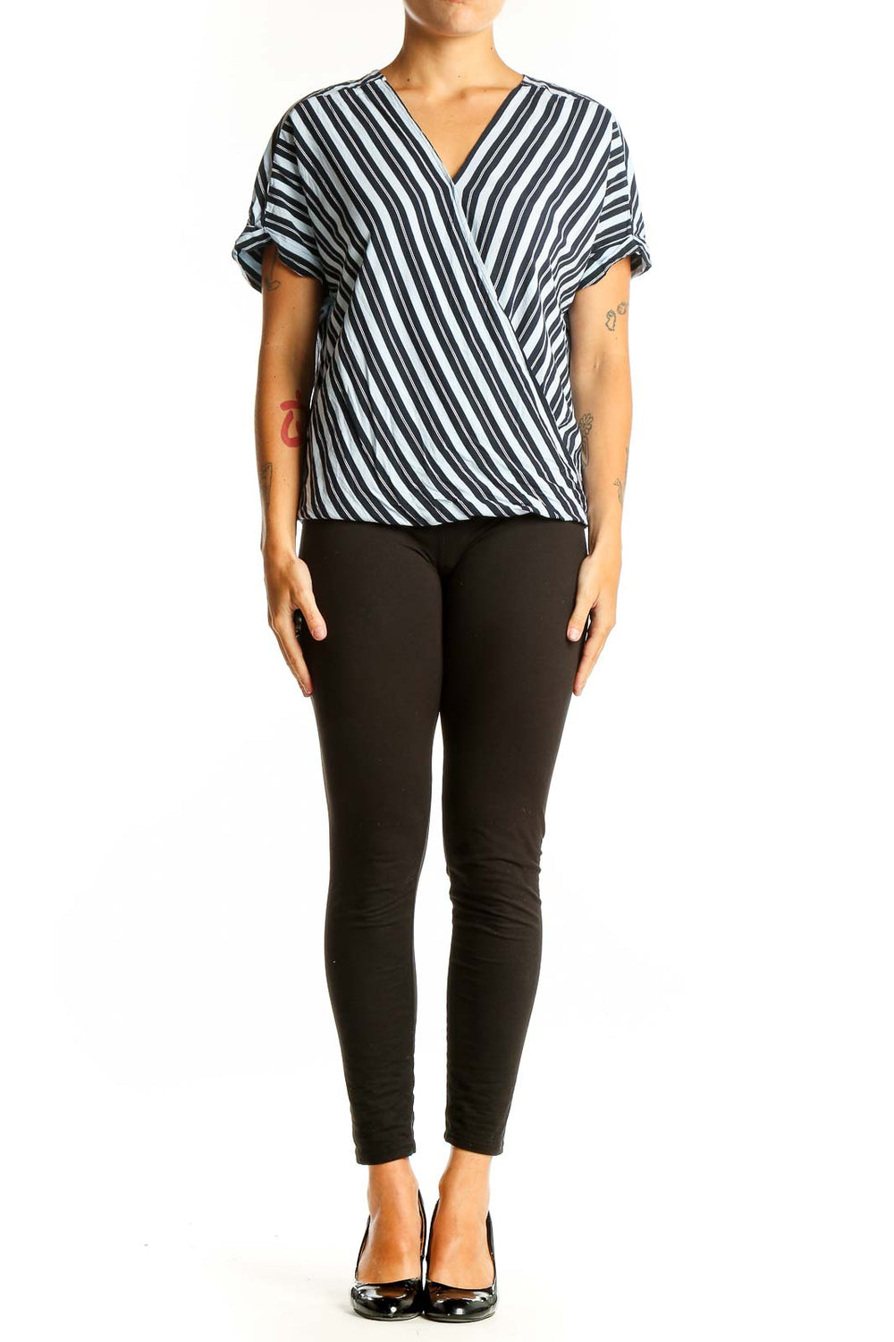 Front view of Ellen Tracy Black and White Striped Wrap Top with V-neckline