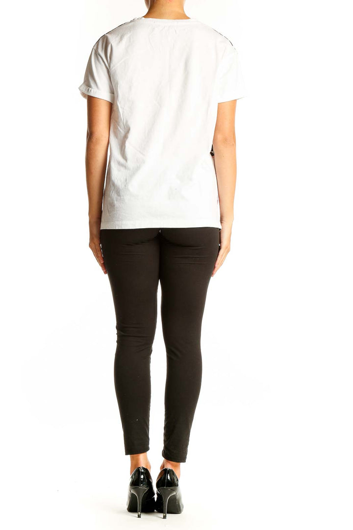 Back view of Etre cecile white t-shirt with pink and black geometric print
