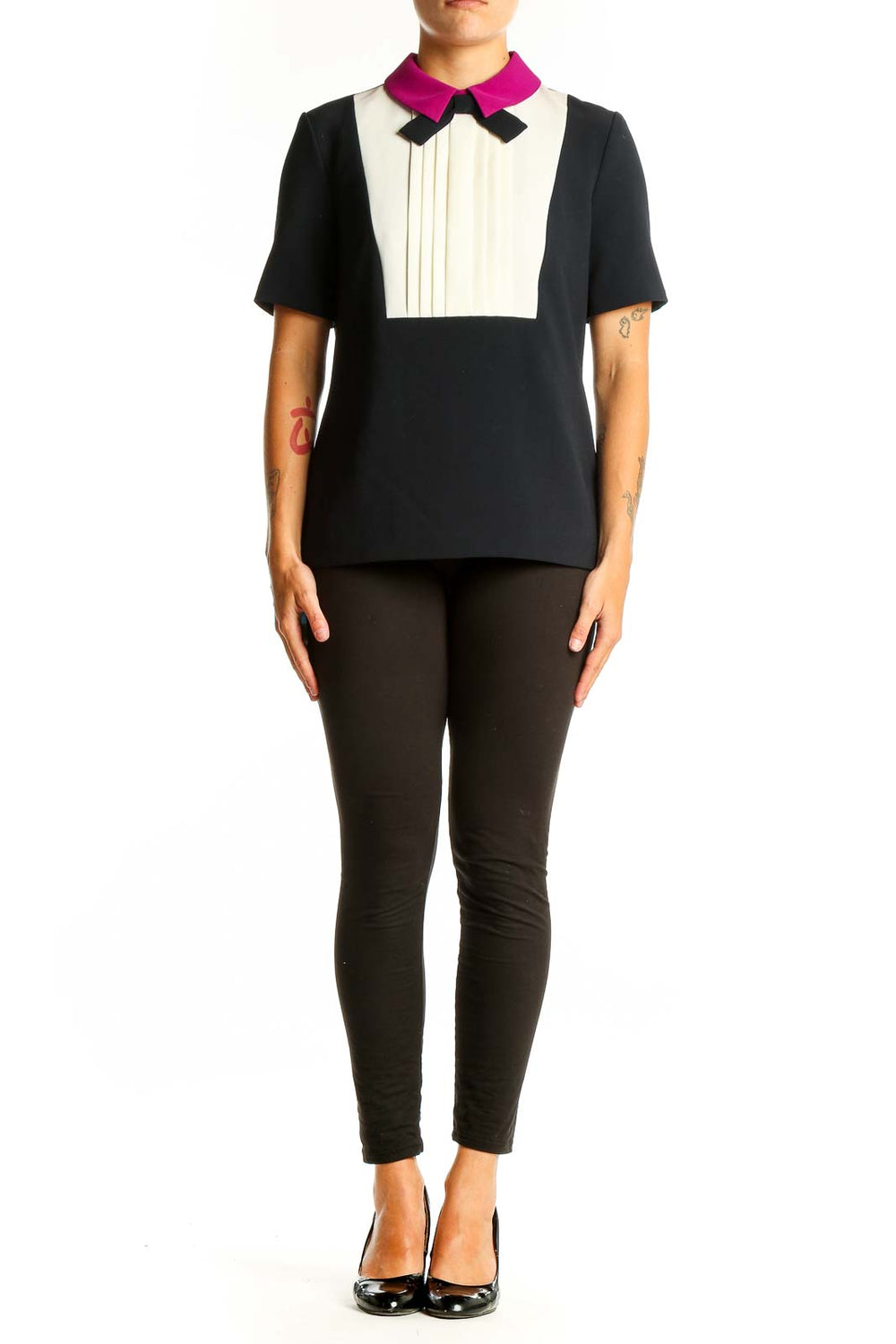 Front view of Ted Baker London black and white color-block top with pleated bib and fuchsia collar